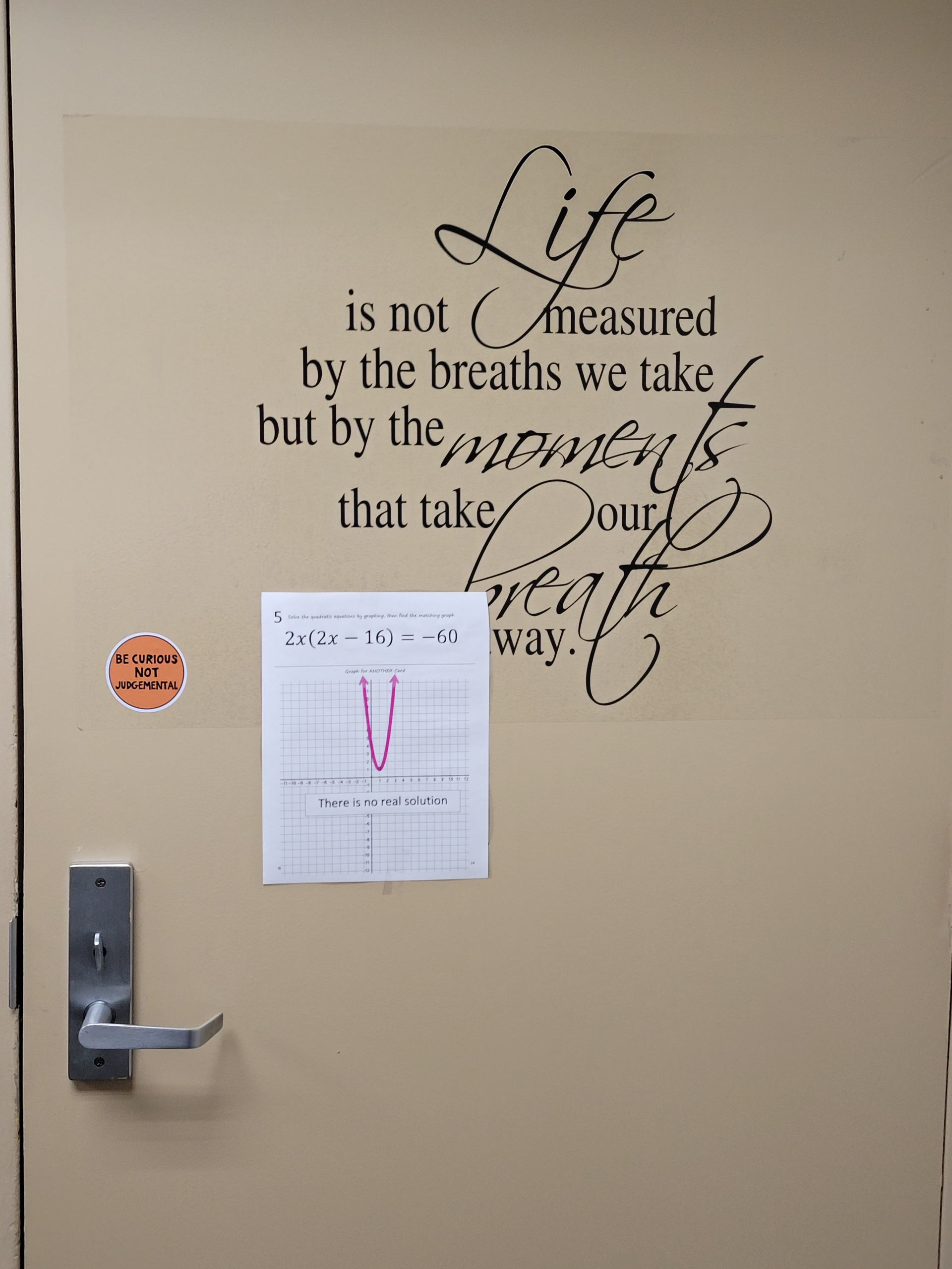 Picture of classroom door with a problems on it